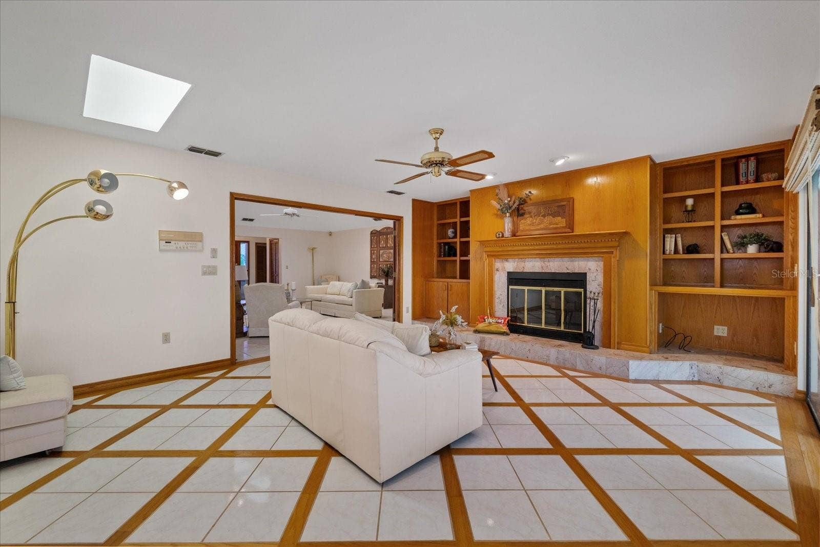 5767 WESTSHORE DRIVE, New Port Richey, FL 34652 Family Room with wood burning fireplace
