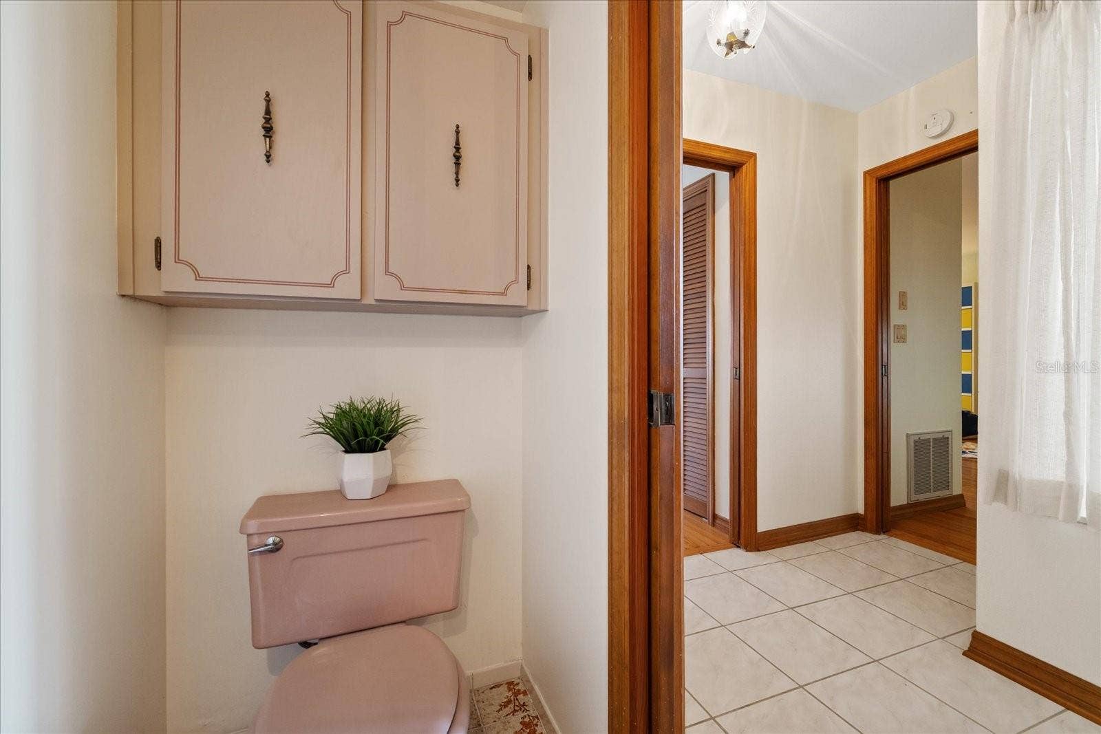5767 WESTSHORE DRIVE, New Port Richey, FL 34652 Half bath at entry level
