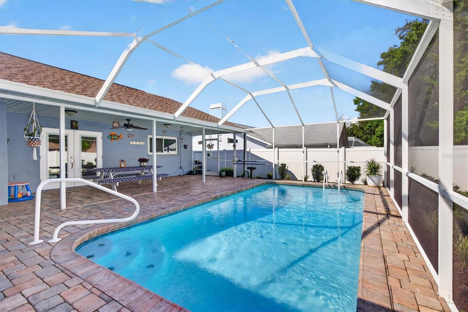 8185 SPANISH OAK DRIVE, Spring Hill, FL 34606 Heated Screened Covered Pool