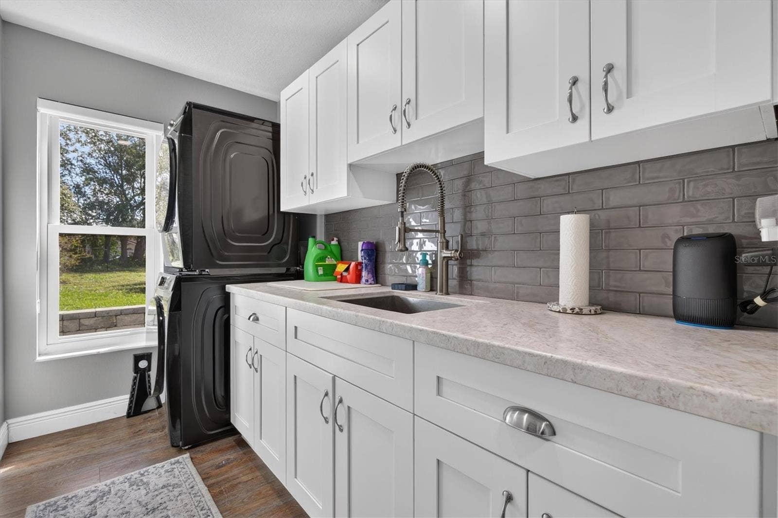 8185 SPANISH OAK DRIVE, Spring Hill, FL 34606 Updated Laundry Room with lots of Storage, Counter Space and a Sink