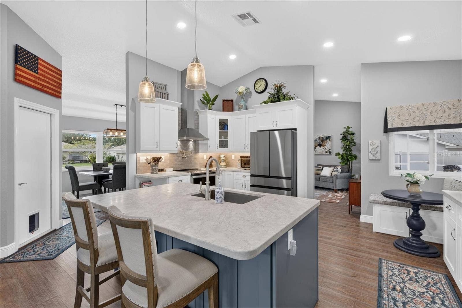8185 SPANISH OAK DRIVE, Spring Hill, FL 34606 Two tone cabinetry with contrasting Island