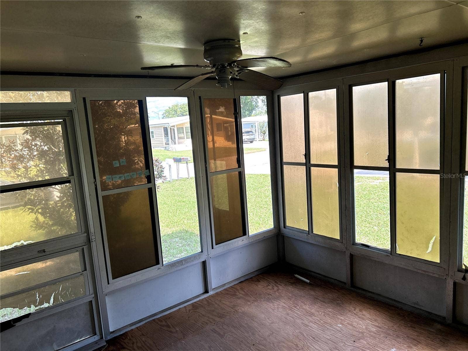 14506 DEHAVEN AVENUE, Brooksville, FL 34613 Screened porch with sliding doors into living area.