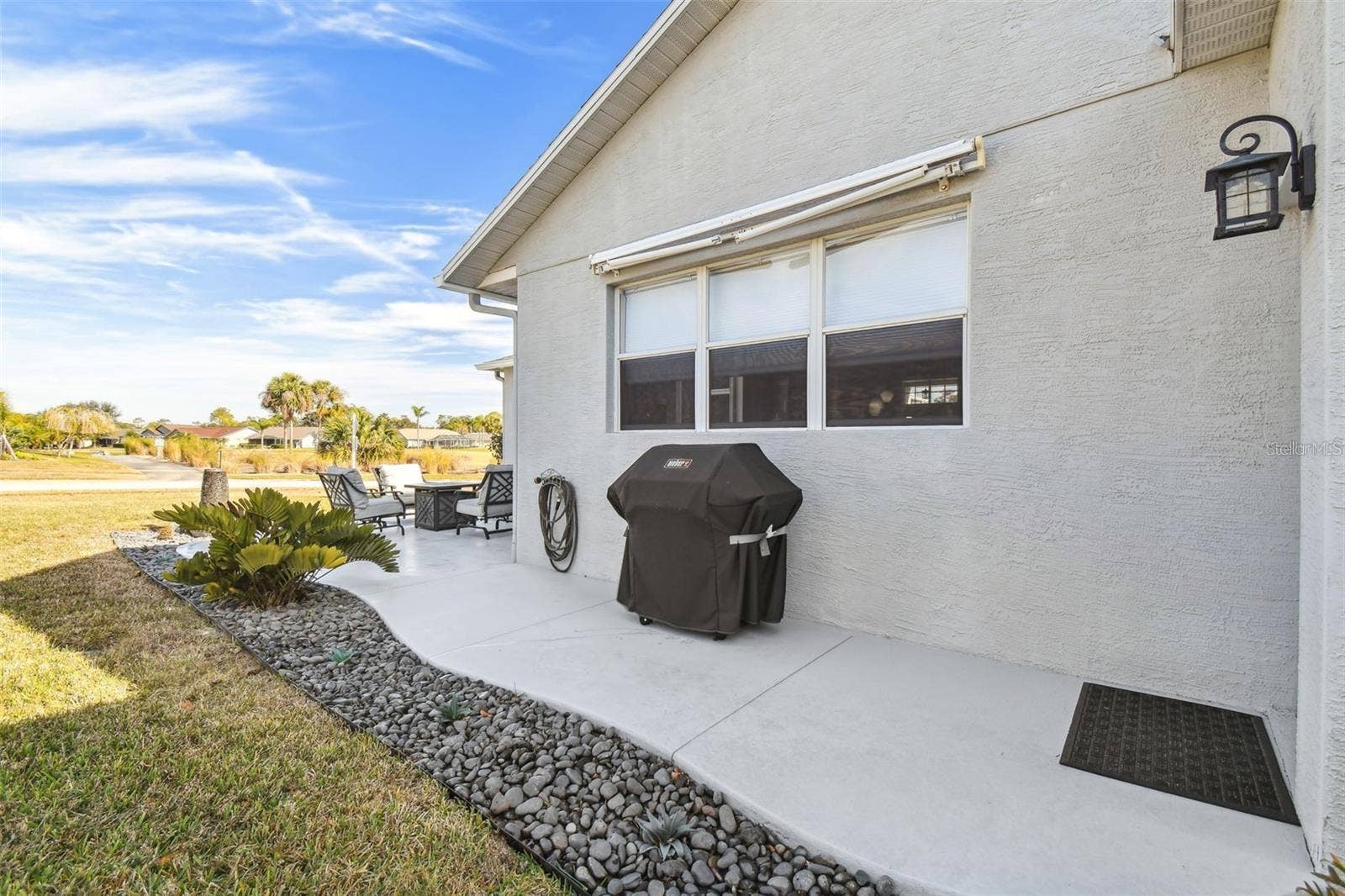 18325 DAVENTRY COURT, Hudson, FL 34667 roll out awning over grill