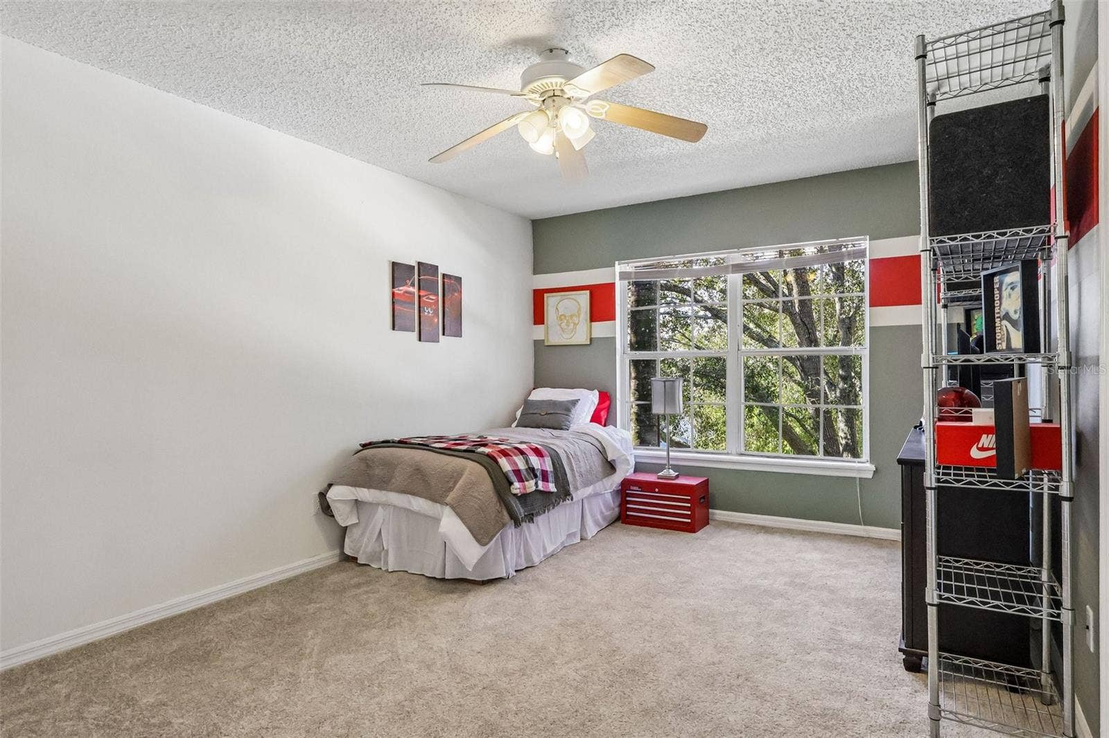 2 of 4 total bedrooms upstairs -- one at each corner of the house.