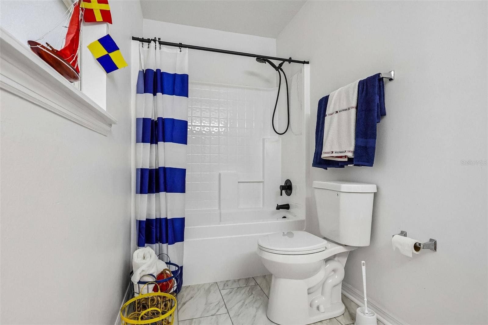 Upstairs guest bathroom is spacious -- great for sharing.