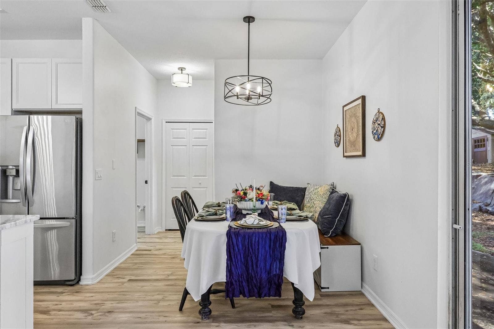 Dining room adjacent to the kitchen and backyard.