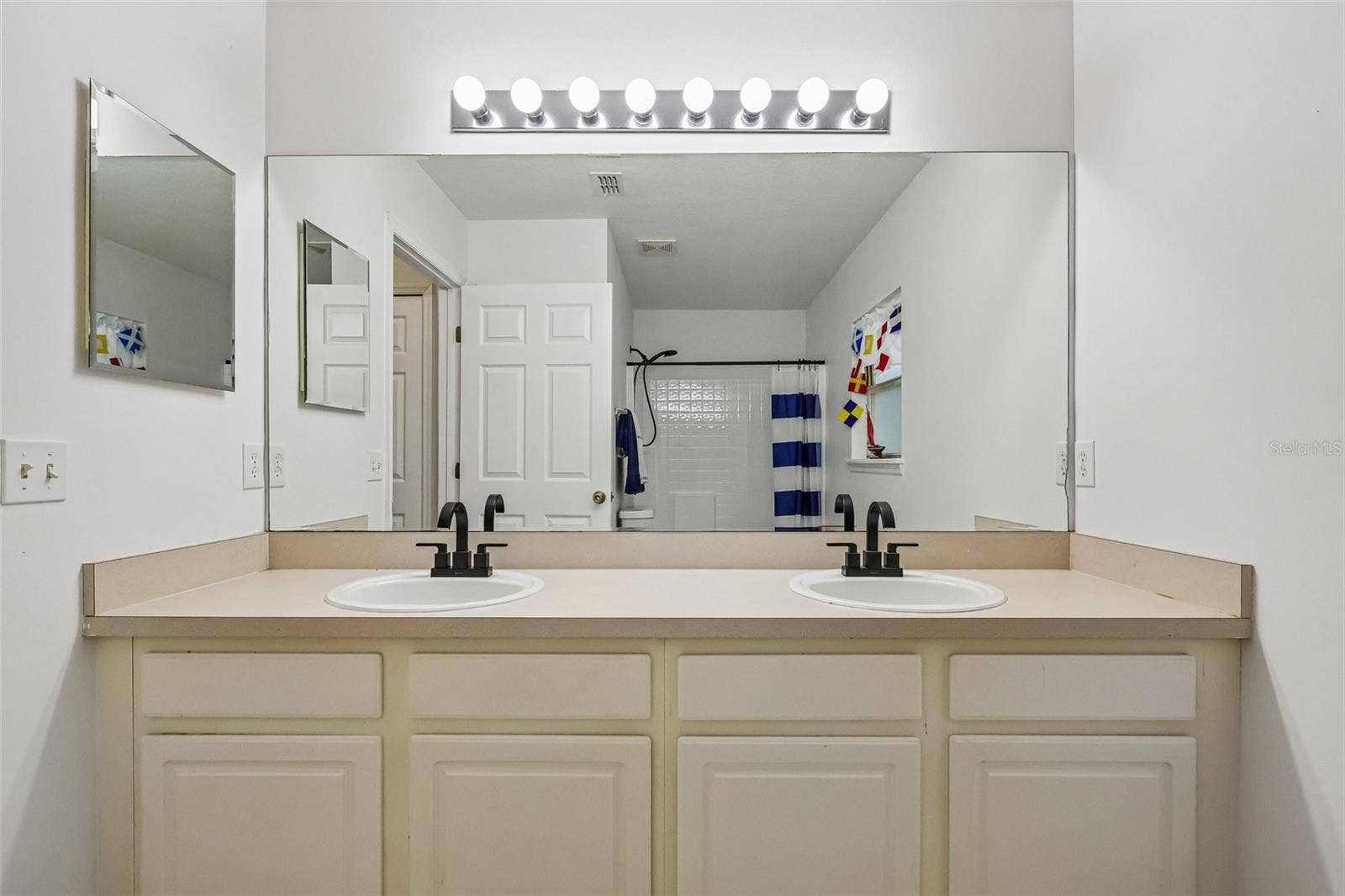 Upstairs guest bathroom is spacious -- great for sharing.