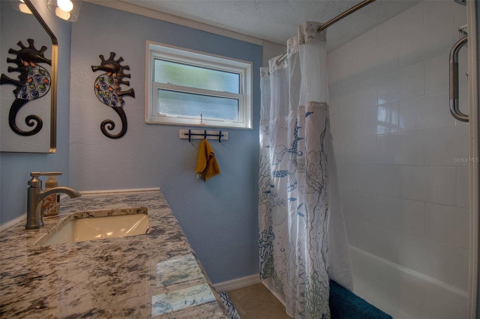 13734 SAN JUAN AVENUE, Hudson, FL 34667 hall bathroom