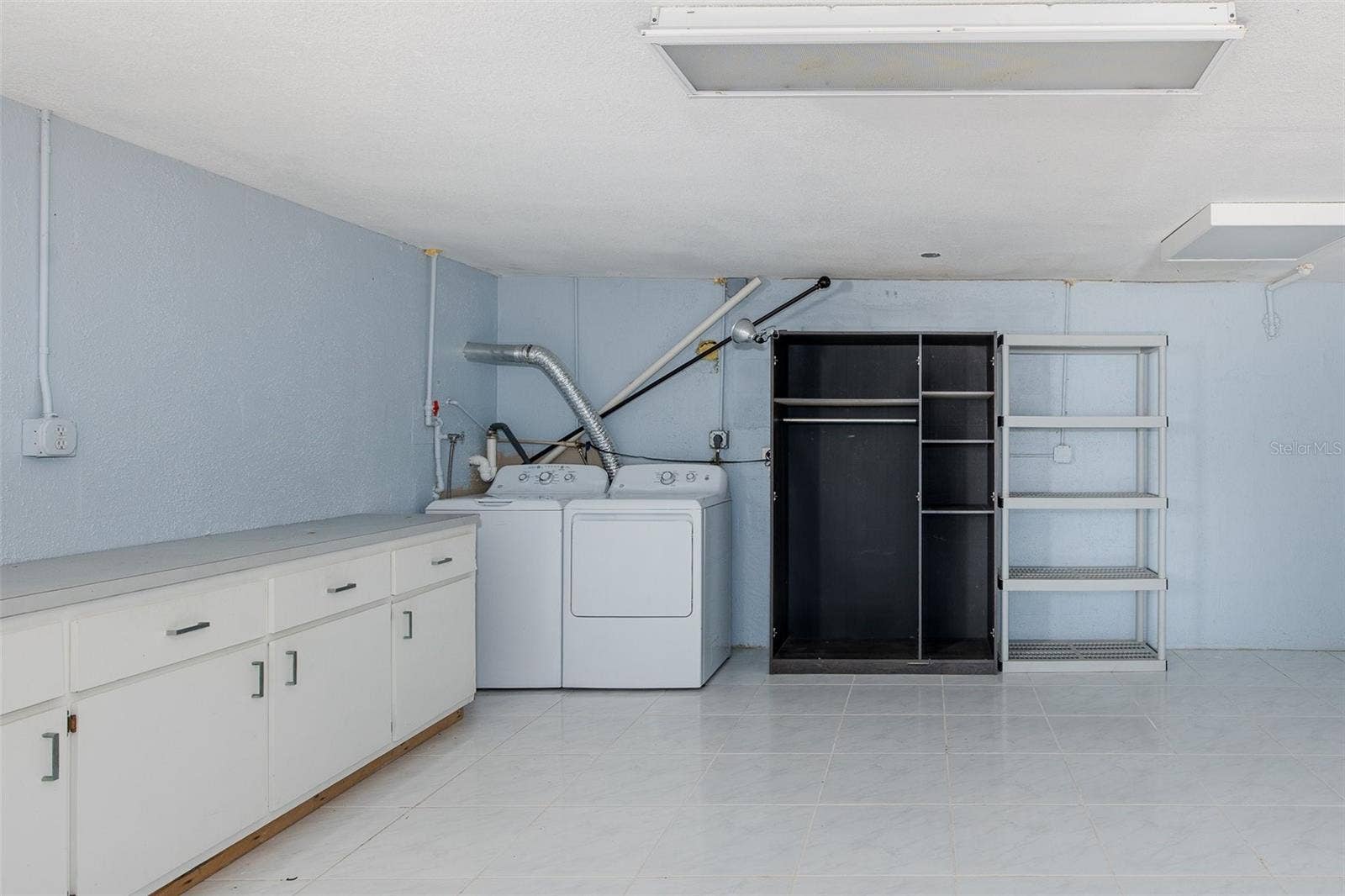 3138 BLUFF BOULEVARD, Holiday, FL 34691 laundry area lower level