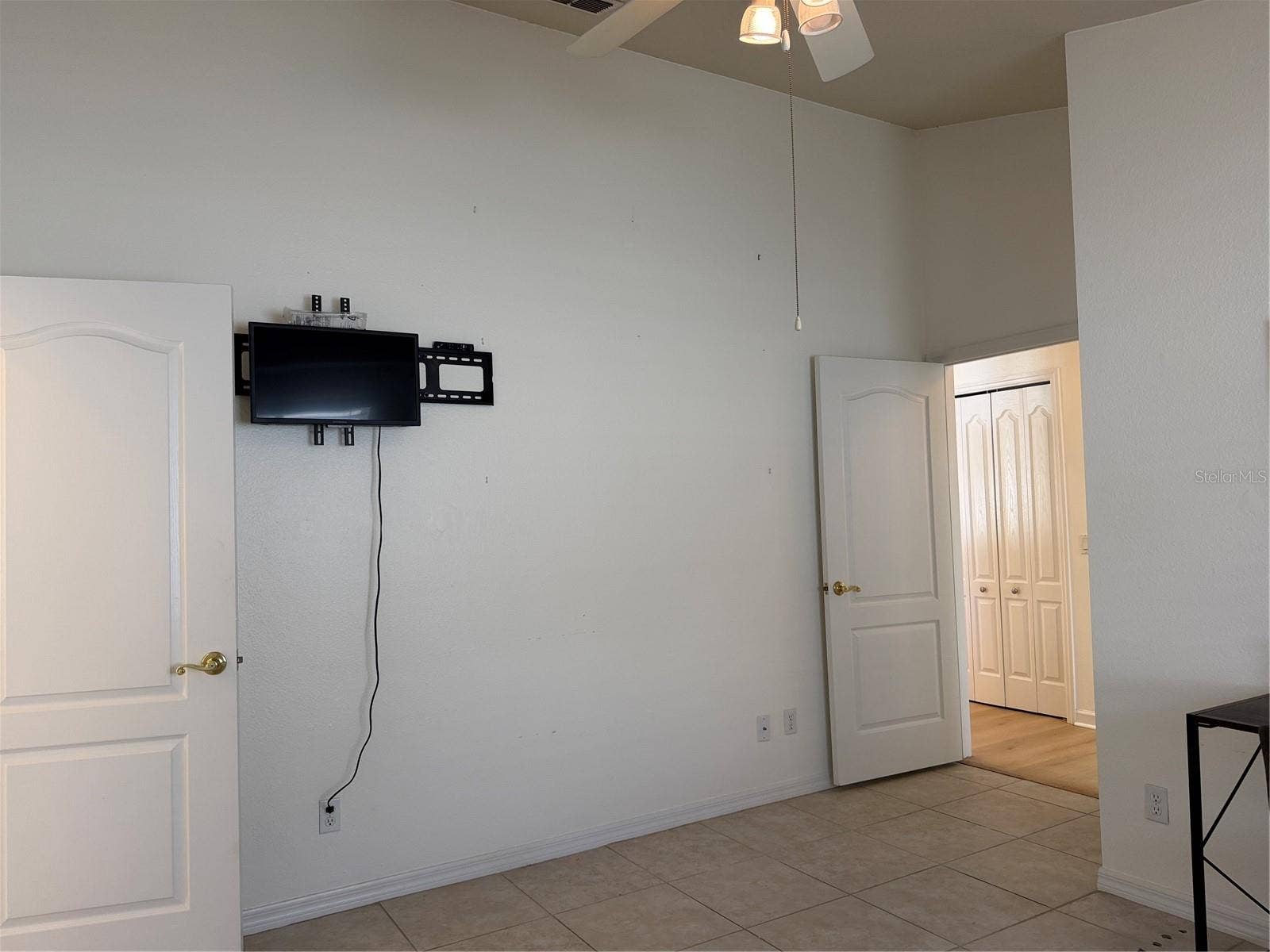 Bracket mounted to wall for flat screen TV