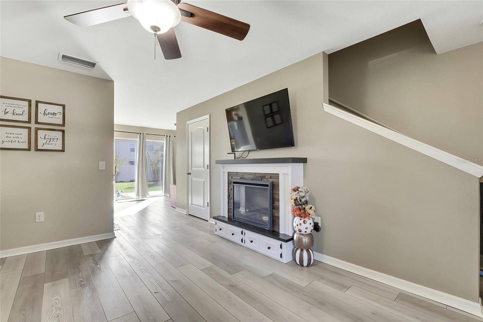 4166 SAND RIDGE BOULEVARD, Spring Hill, FL 34609 Living Room with fire place