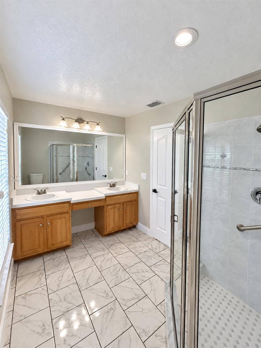 10500 TIMBERCREST ROAD, Spring Hill, FL 34608 Primary bathroom with double vanity