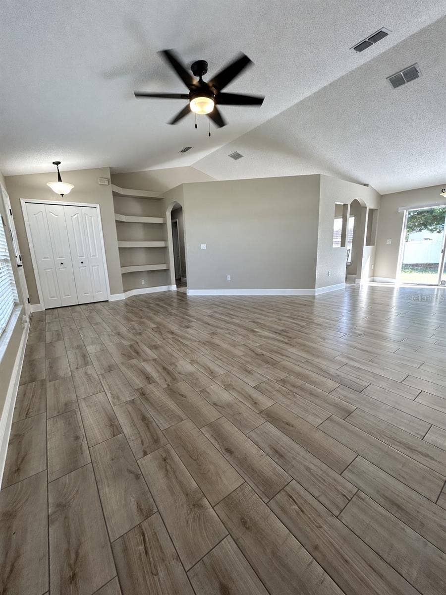 10500 TIMBERCREST ROAD, Spring Hill, FL 34608 Living area with built-in shelves