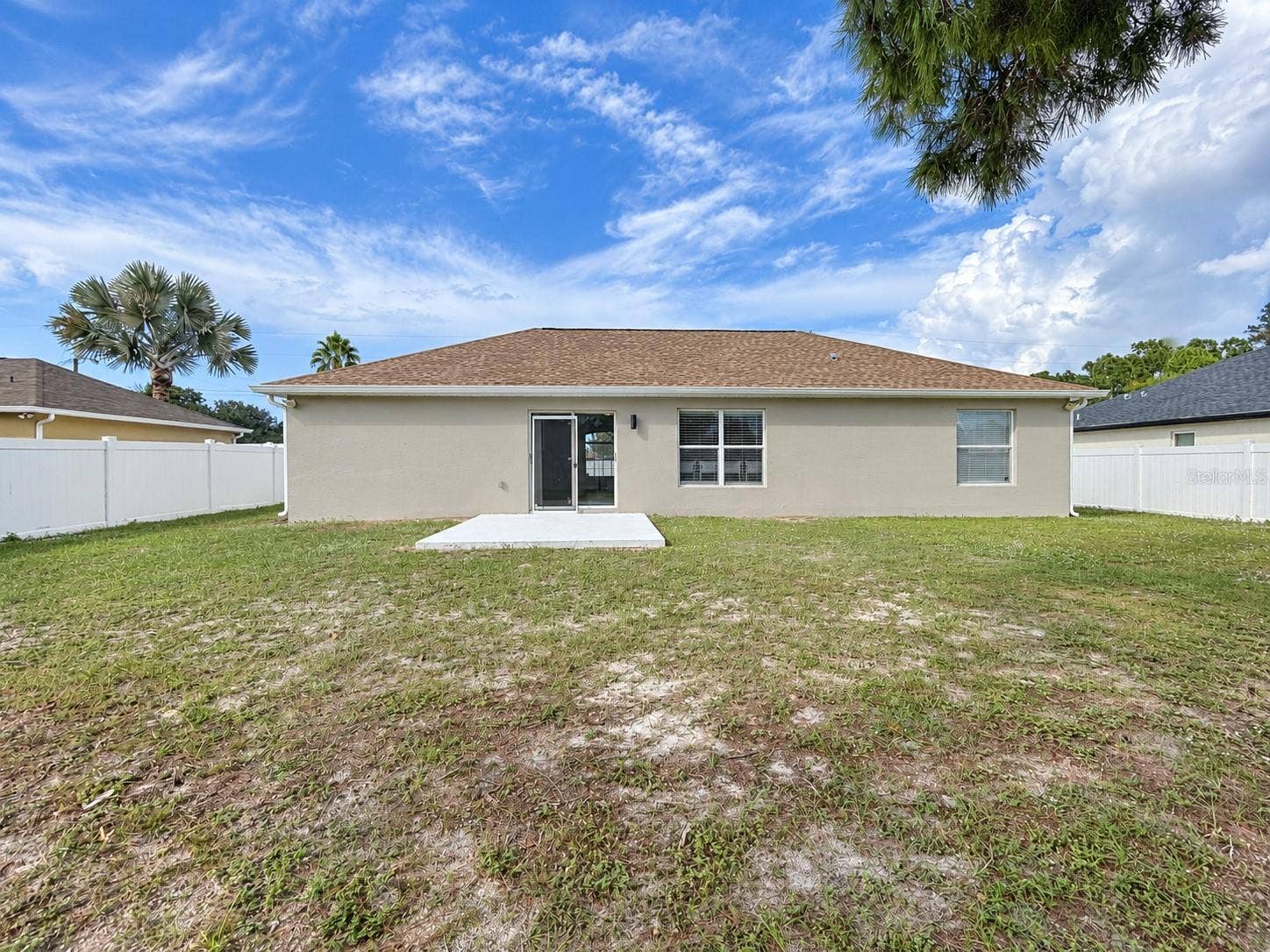 10500 TIMBERCREST ROAD, Spring Hill, FL 34608 Rear exterior and patio