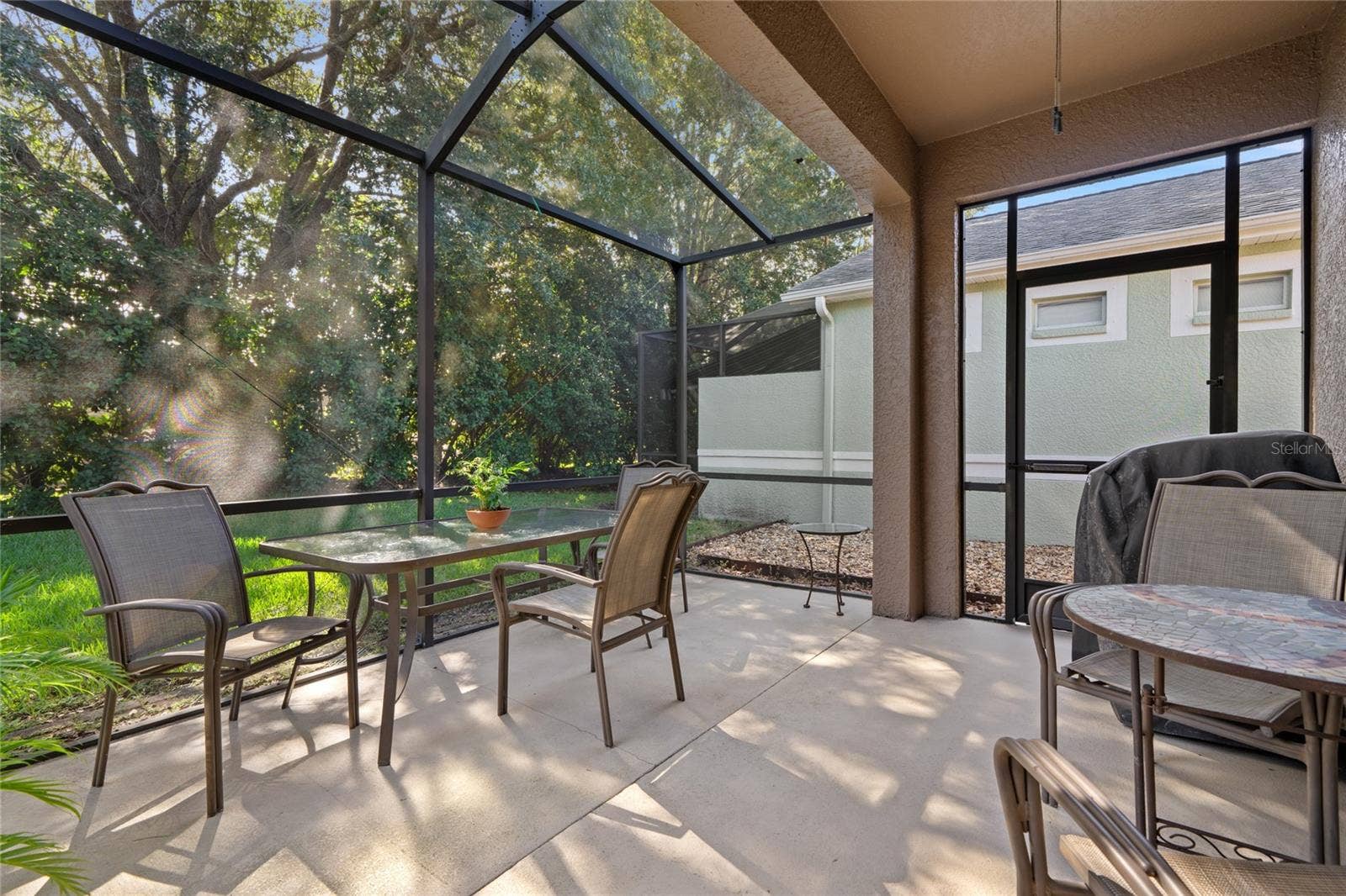 8112 AMBERSWEET PLACE, Land O Lakes, FL 34637 SCREENED LANAI