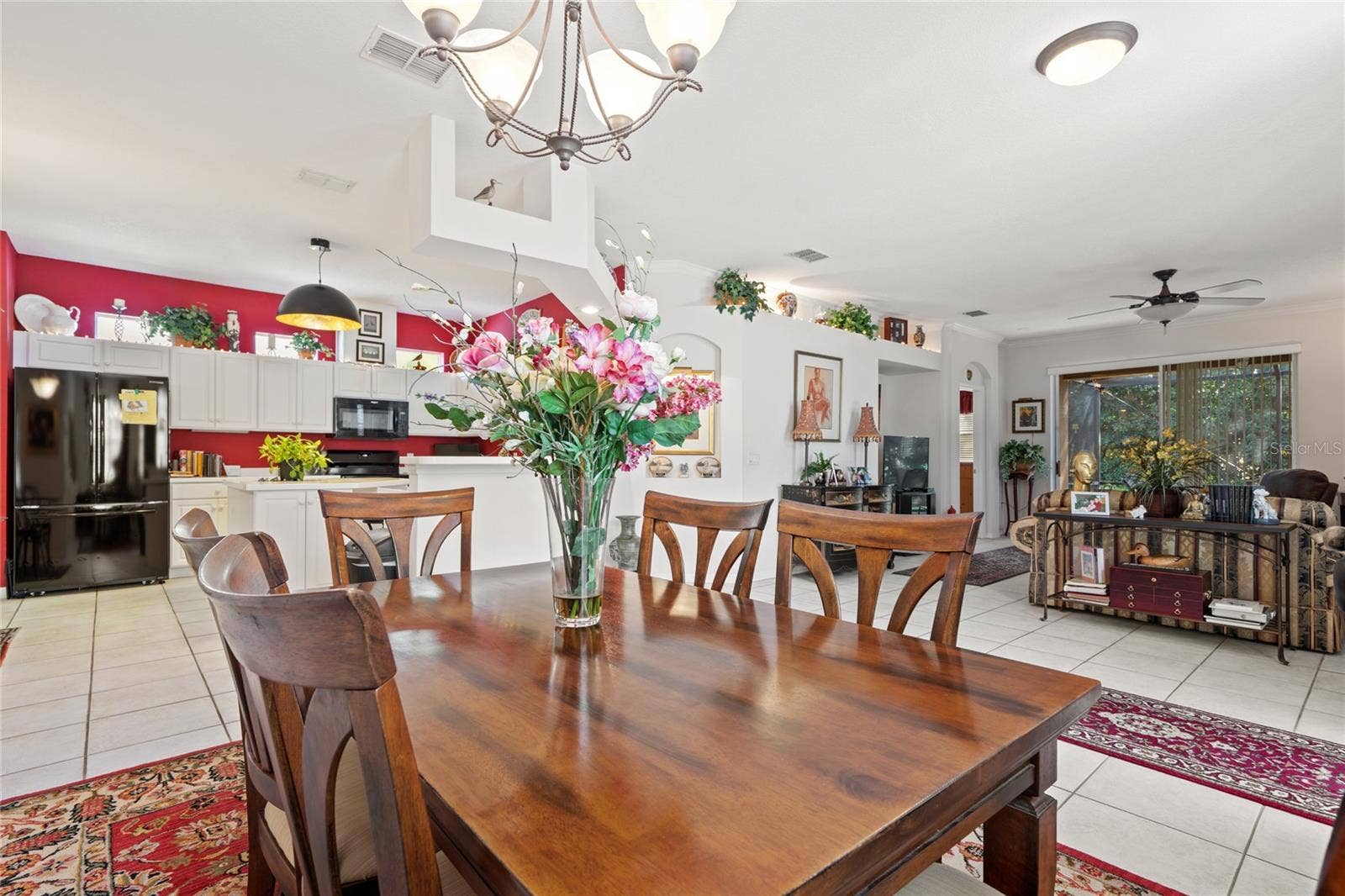 8112 AMBERSWEET PLACE, Land O Lakes, FL 34637 DINING ROOM AND KITCHEN