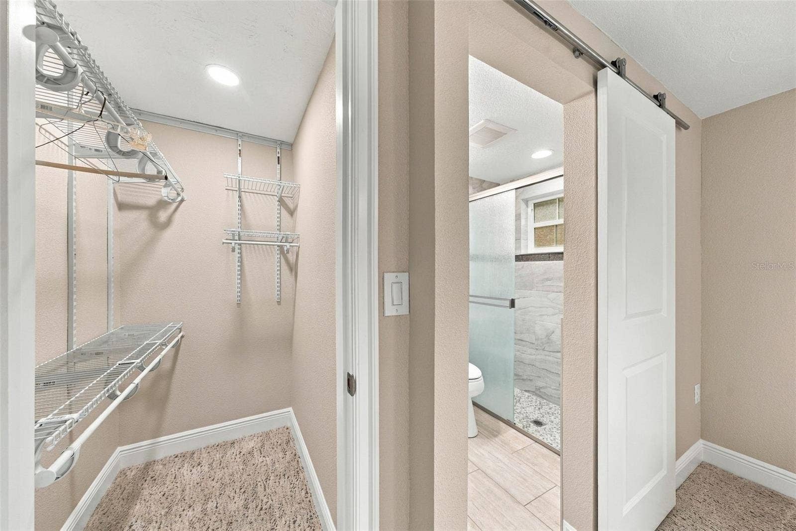 4219 STRATFORD DRIVE, #4219, New Port Richey, FL 34652 Primary bedroom walk in closet