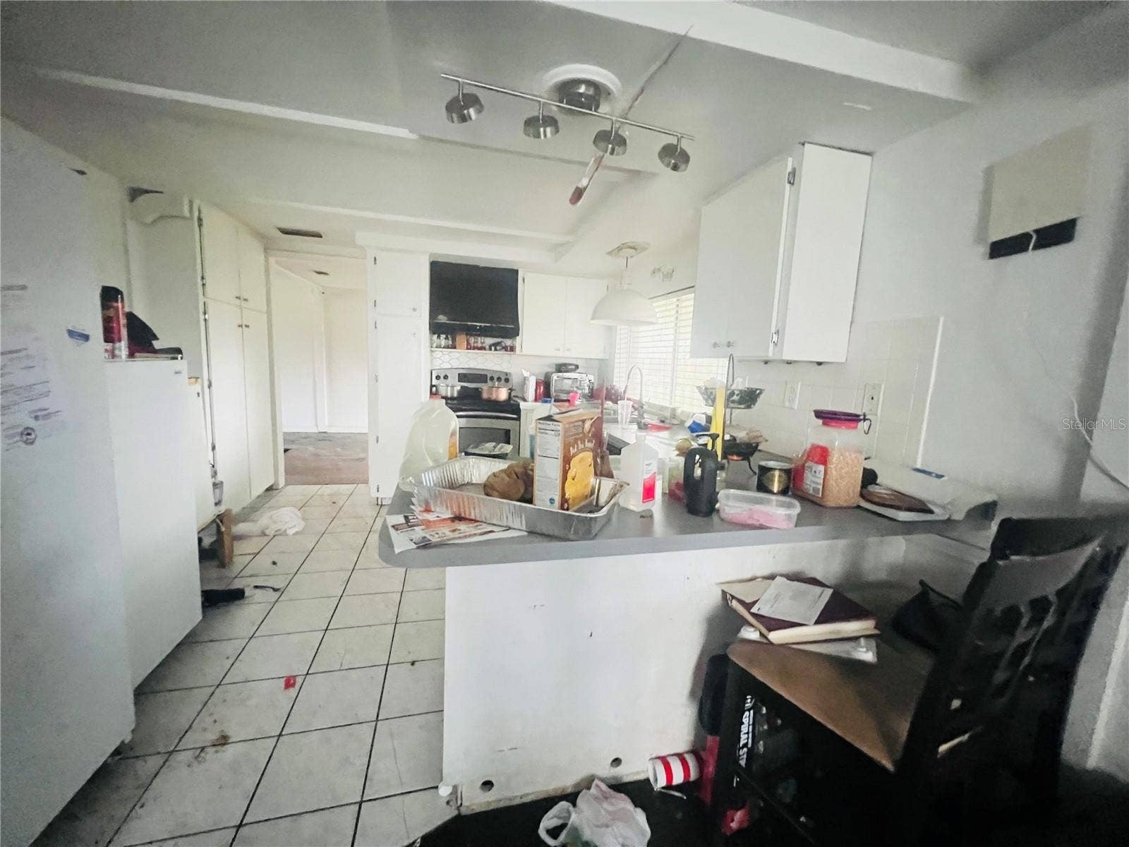 KITCHEN VIEW FROM FAMILY ROOM