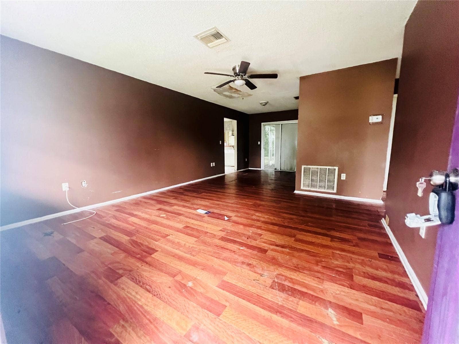 3131 CHALON STREET, New Port Richey, FL 34655 LIVING AND DINING AREA VIEW FROM FRONT DOOR