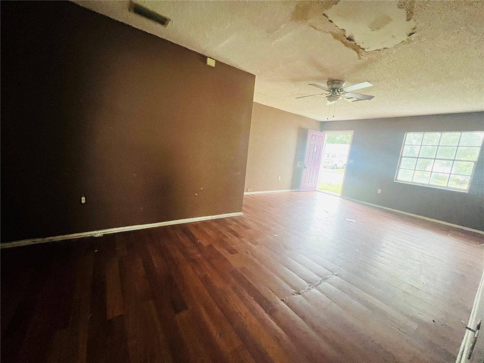 3131 CHALON STREET, New Port Richey, FL 34655 VIEW FROM KITCHEN TO DINING AND LIVING AREA