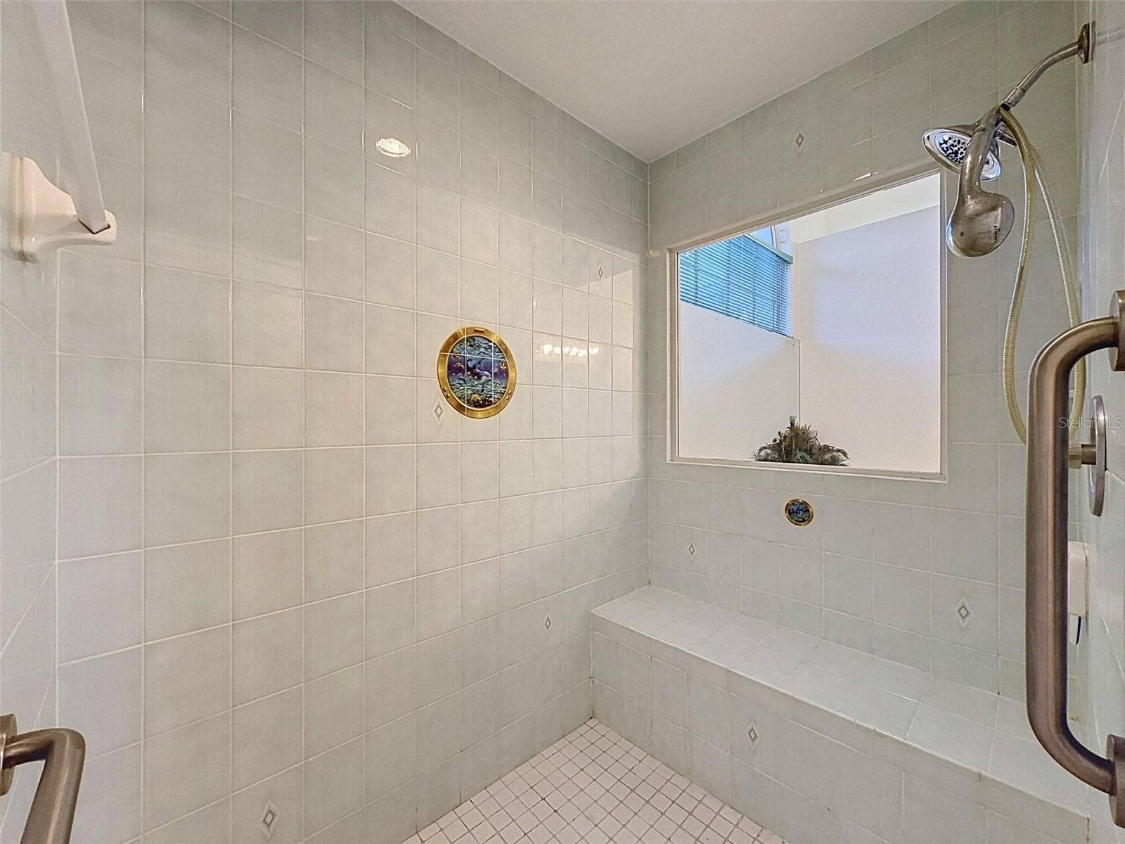 10074 SLEEPY WILLOW COURT, Spring Hill, FL 34608 Owner's suite includes jetted tub, two WICs, linen closet, water closet, two vanities, and large shower.