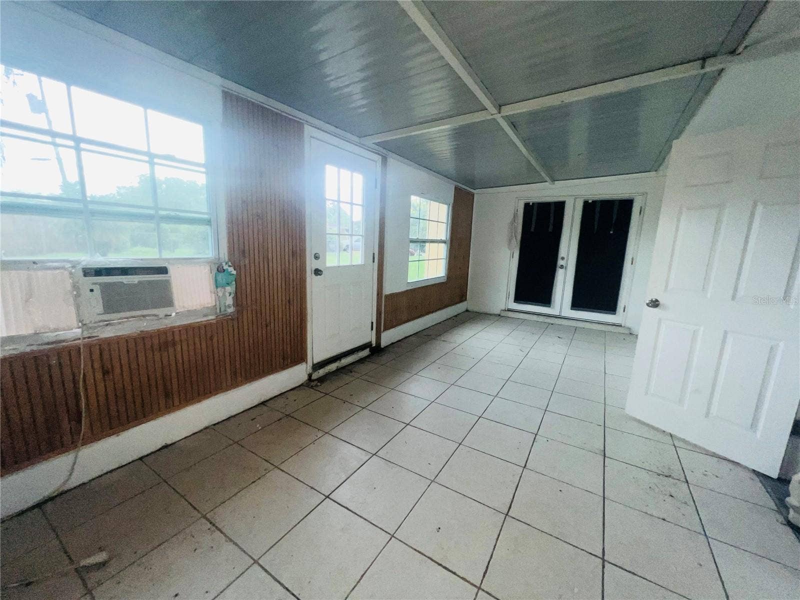 7427 JASMINE BOULEVARD, Port Richey, FL 34668 FLORIDA ROOM OR CRAFT ROOM WORKOUT ROOM