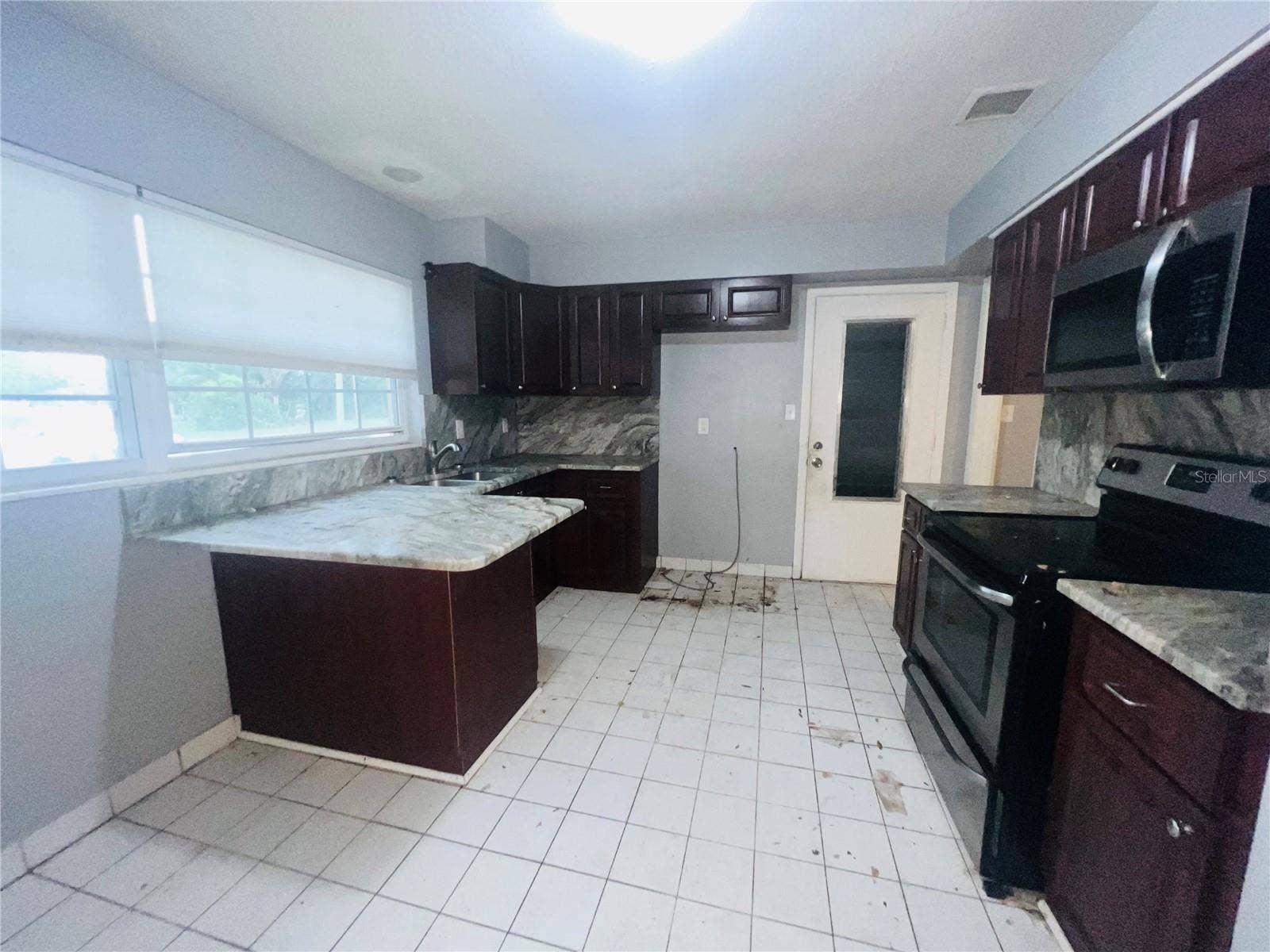 7427 JASMINE BOULEVARD, Port Richey, FL 34668 KITCHEN WITH EATING SPCAE