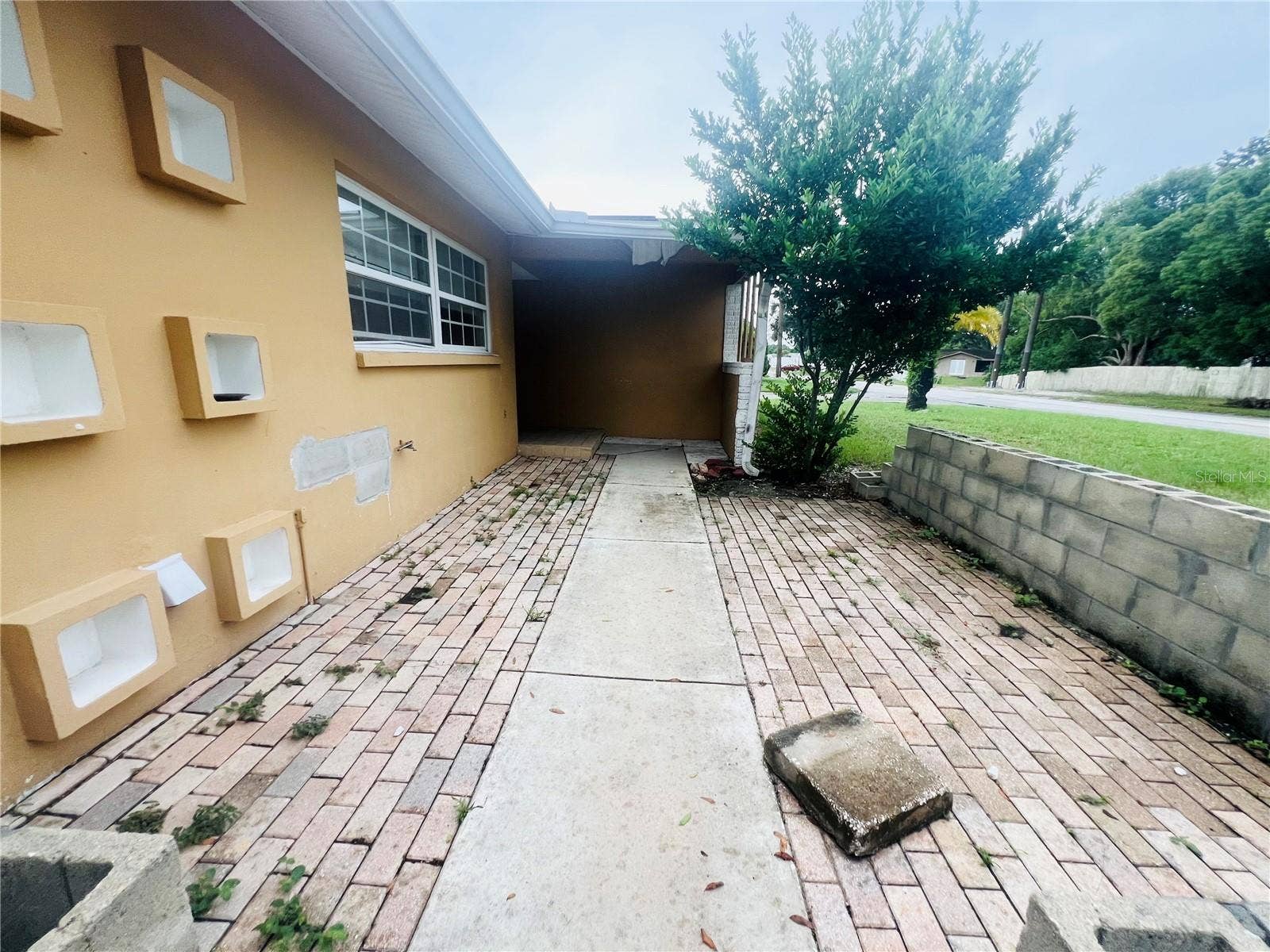 7427 JASMINE BOULEVARD, Port Richey, FL 34668 PAVERED PATIO AREA
