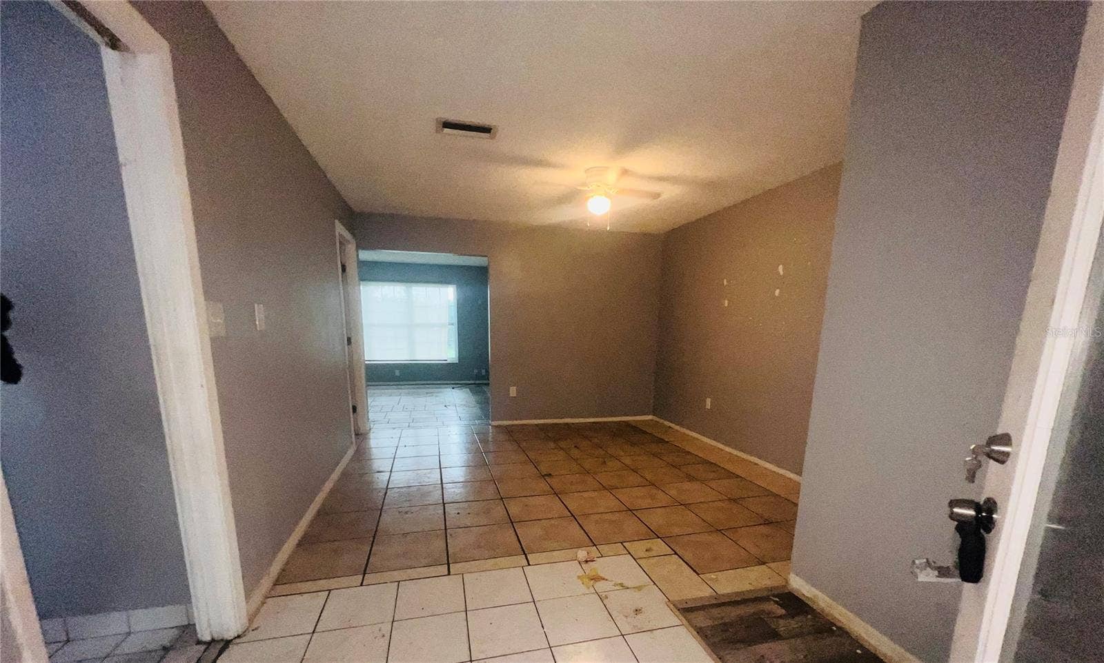 7427 JASMINE BOULEVARD, Port Richey, FL 34668 LIVINGROOM OR DINING AREA