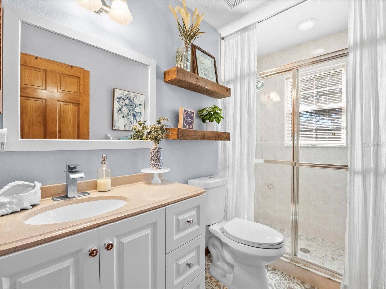 9073 MADRID ROAD, Weeki Wachee, FL 34613 hallway bathroom