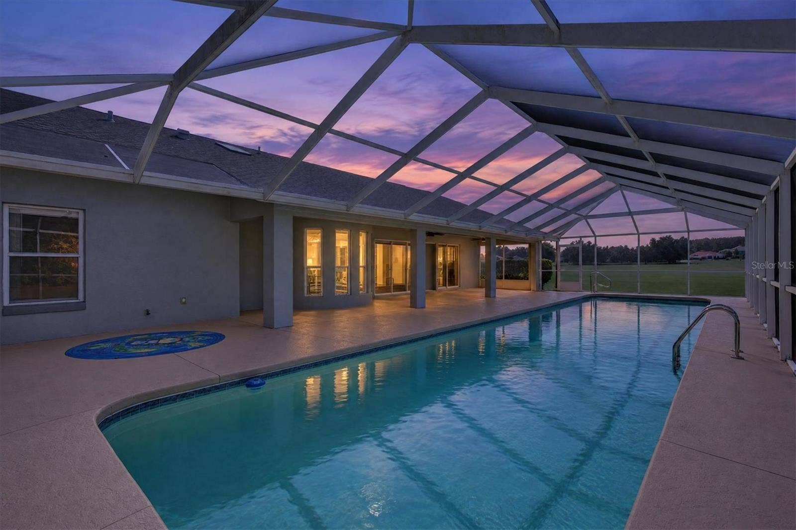 442 N CHERRY POP DRIVE, Inverness, FL 34453 Lanai and Pool at Dusk