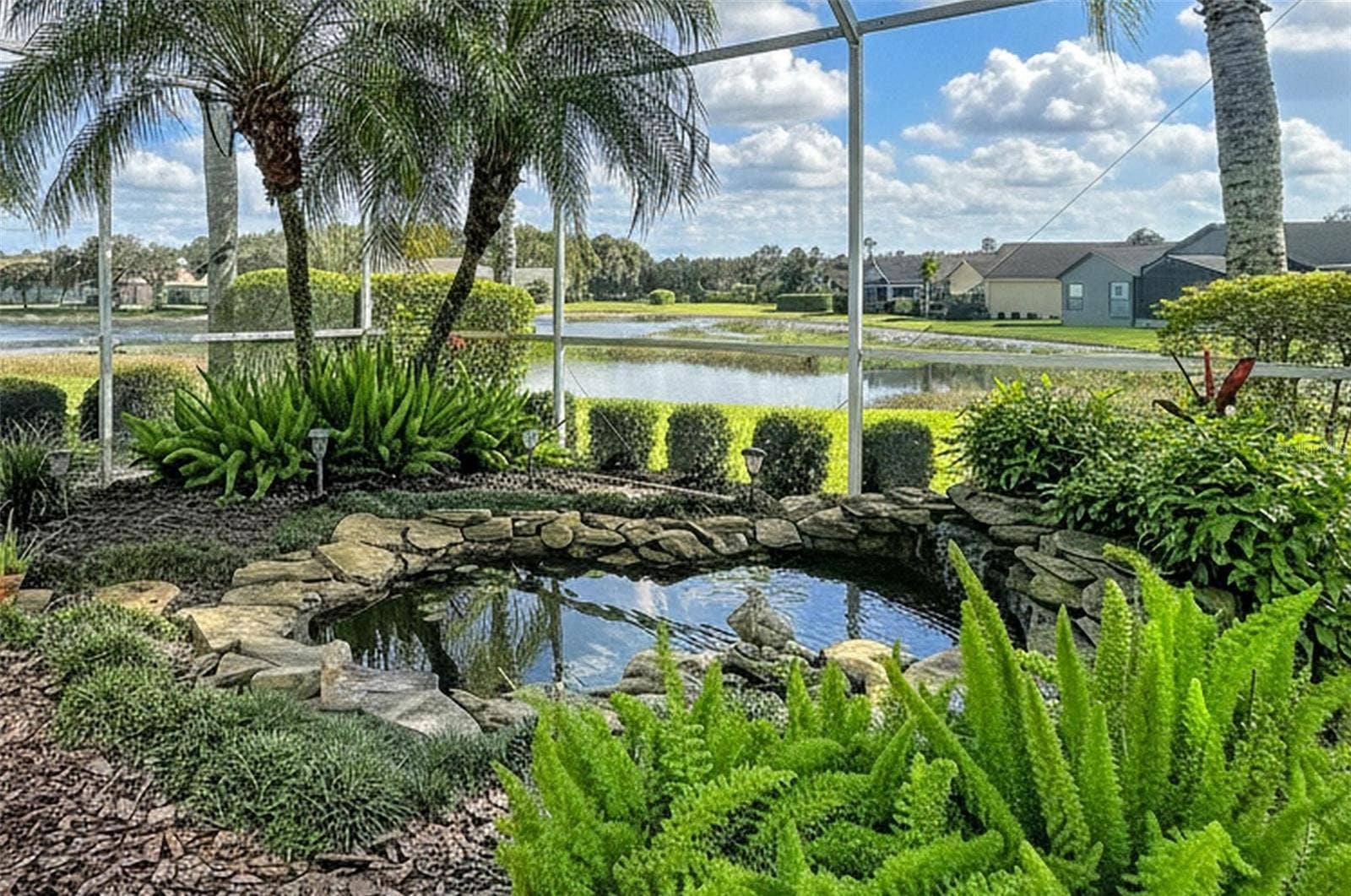 12116 BROADGREEN PLACE, Trinity, FL 34655 Small pond surrounded by the garden