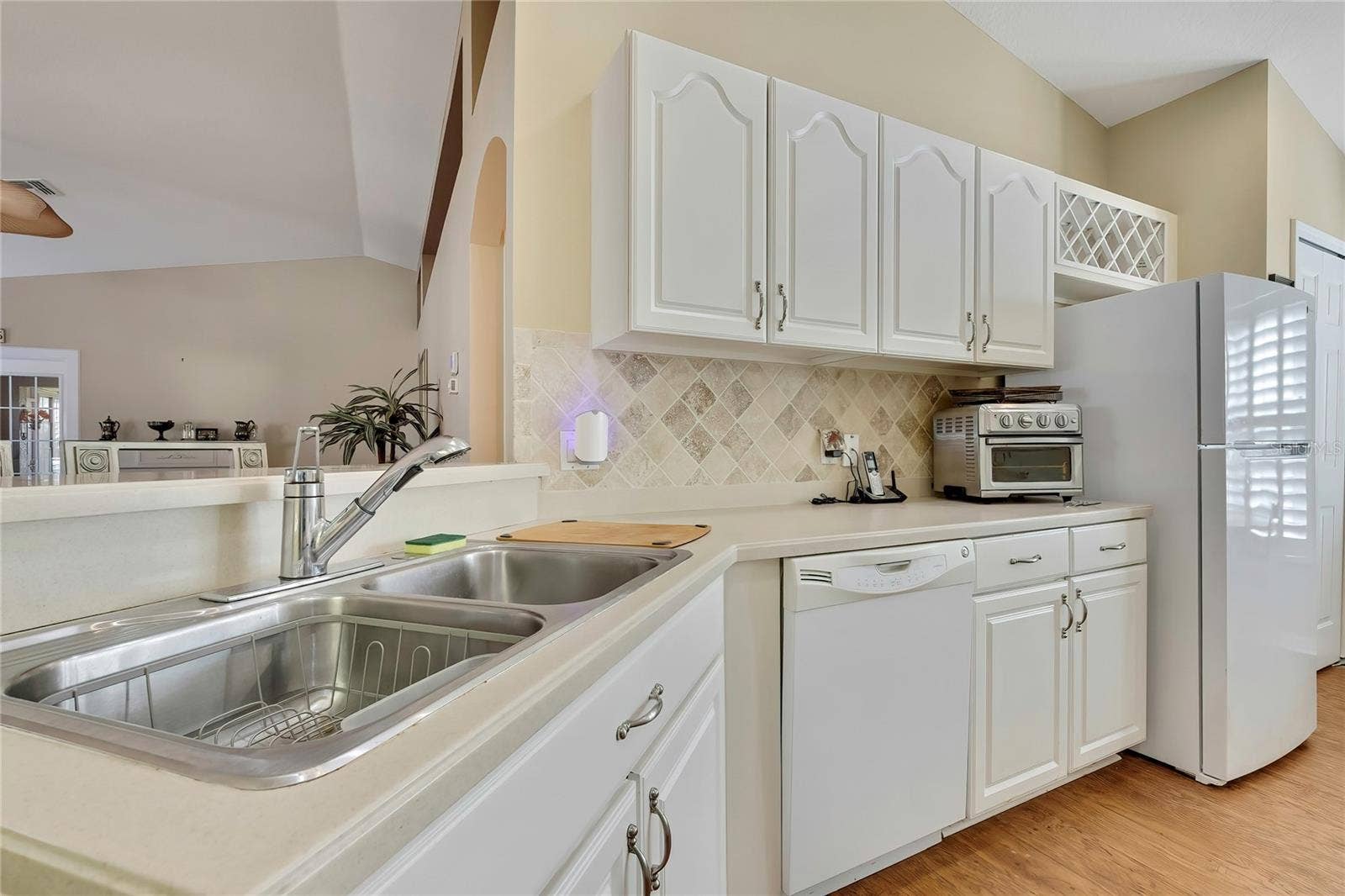 300 HARTFORD COURT, Spring Hill, FL 34609 Wood and Glass Cabinets, Corian Counters