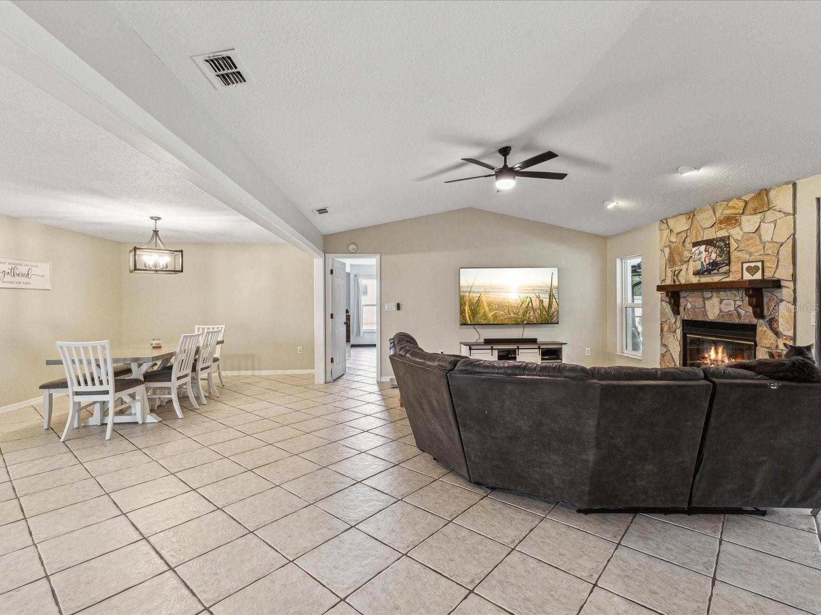 1222 HUNTINGTON AVENUE, Spring Hill, FL 34609 Family Room and Dining Area