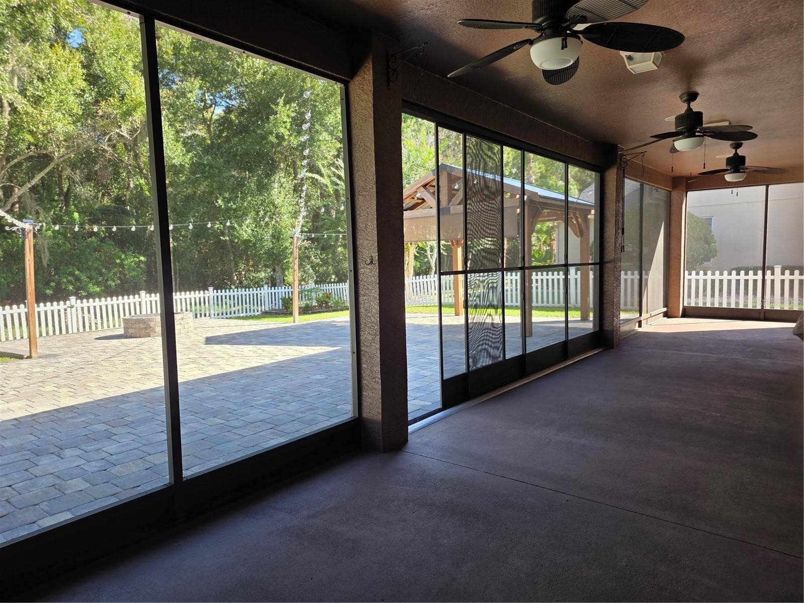 7711 ARELLI DRIVE, New Port Richey, FL 34655 Screened Lanai with retracting screens