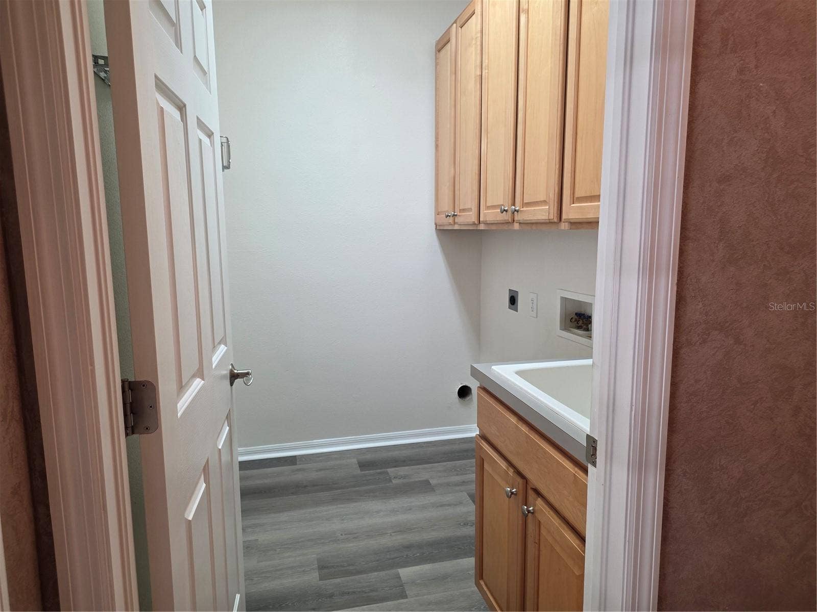 7711 ARELLI DRIVE, New Port Richey, FL 34655 1st floor laundry room