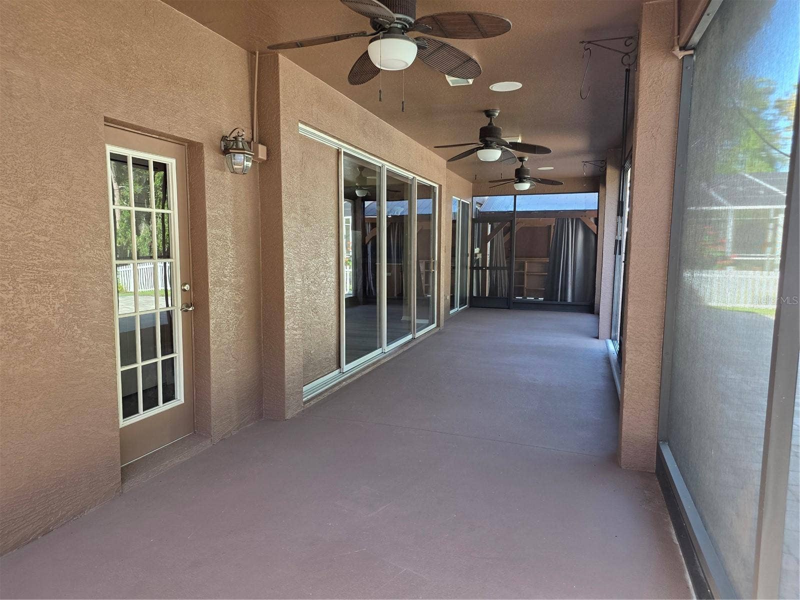 7711 ARELLI DRIVE, New Port Richey, FL 34655 Screened Lanai with retracting screens