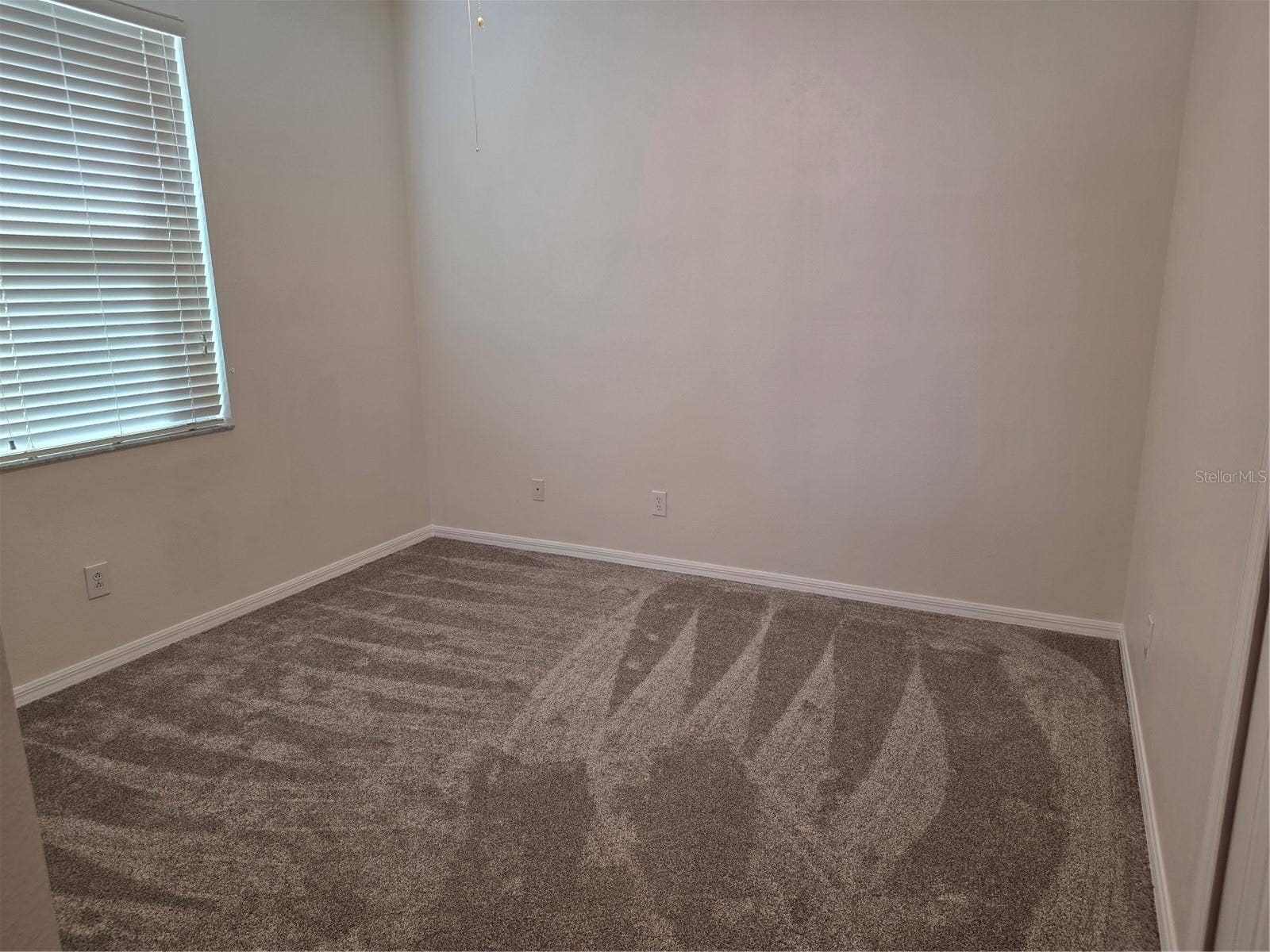 7711 ARELLI DRIVE, New Port Richey, FL 34655 1st floor bedroom