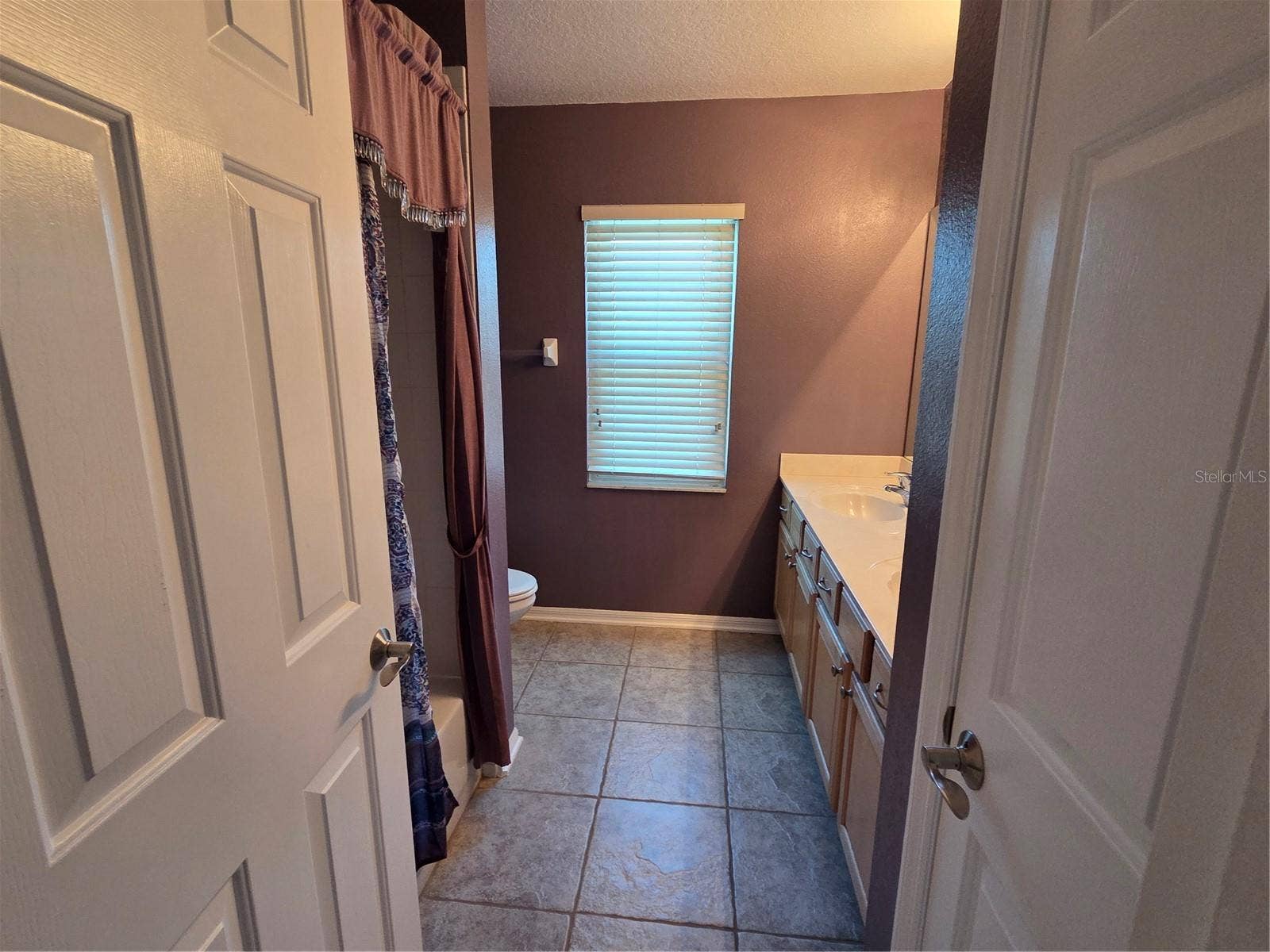 7711 ARELLI DRIVE, New Port Richey, FL 34655 Upstairs hall bathroom