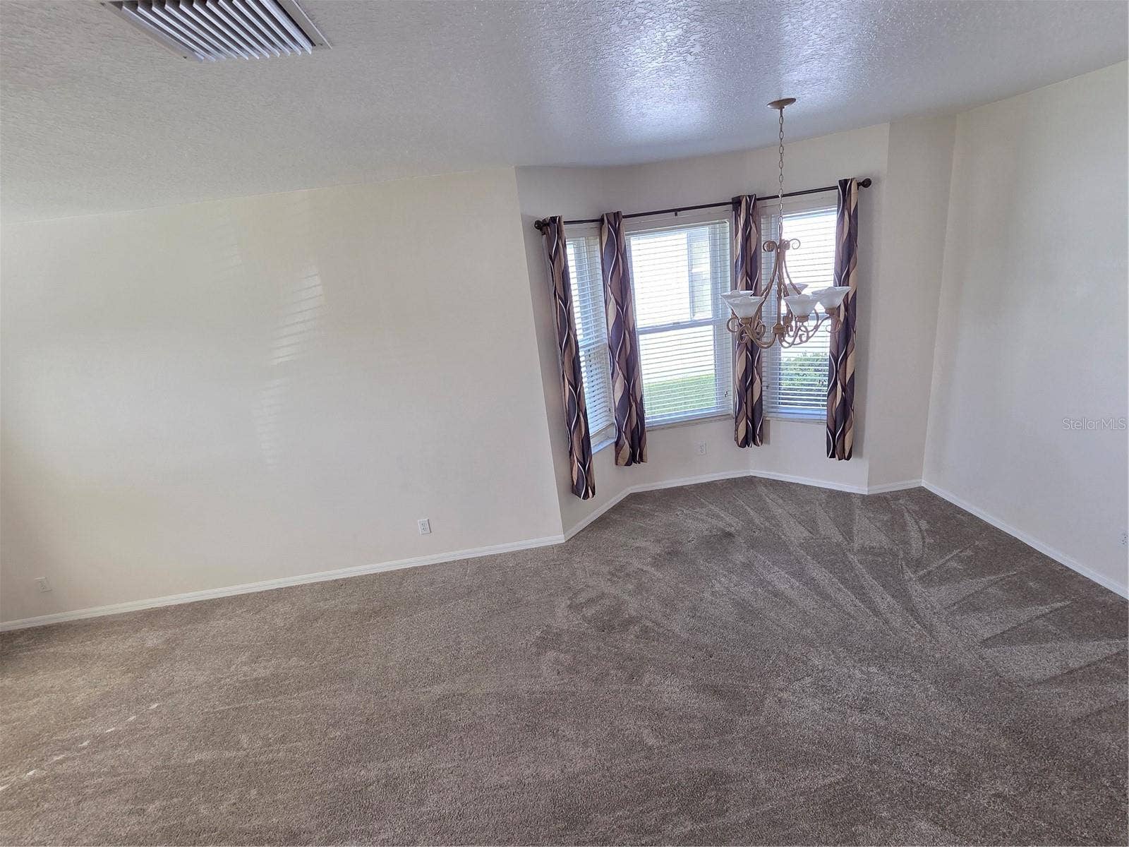 7711 ARELLI DRIVE, New Port Richey, FL 34655 Dining/ living room combo