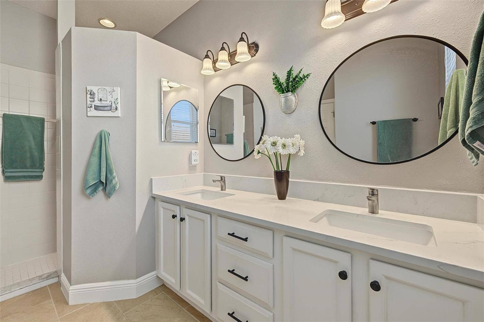 1929 WESTERHAM LOOP, Trinity, FL 34655 The double vanity provides additional storage options