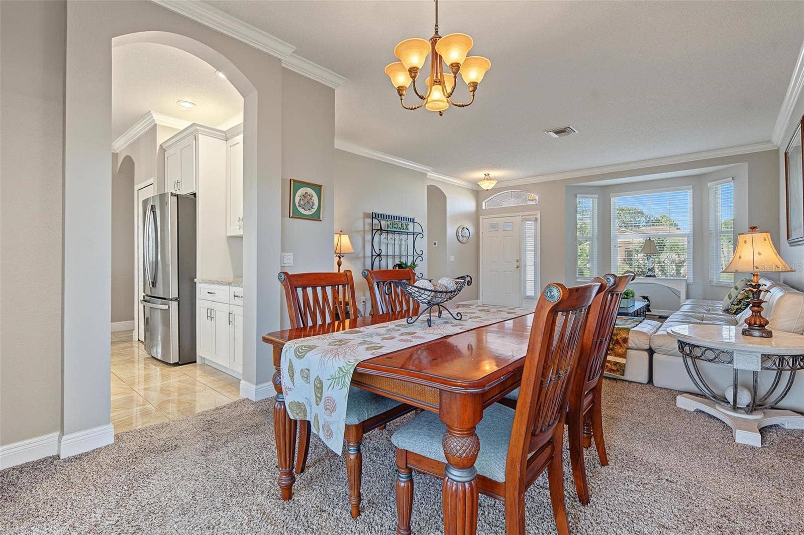 1929 WESTERHAM LOOP, Trinity, FL 34655 Dining room adjoins kitchen and living room for easy entertaining