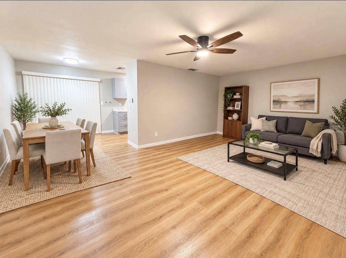 4581 DELTONA BOULEVARD, Spring Hill, FL 34606 Virtually Staged View of Living Room and Dining Room