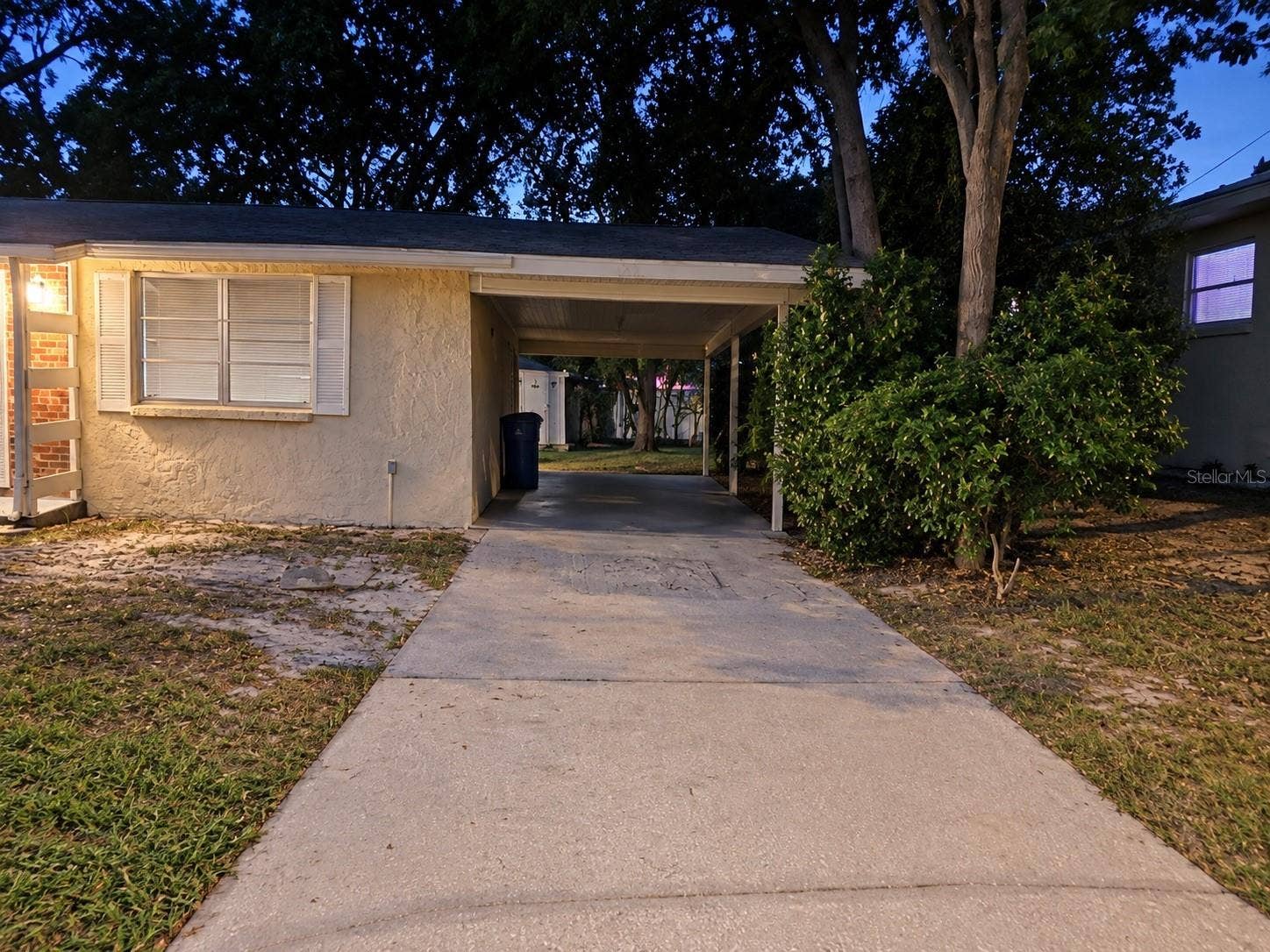 4581 DELTONA BOULEVARD, Spring Hill, FL 34606 View of Long Driveway leading to Carport