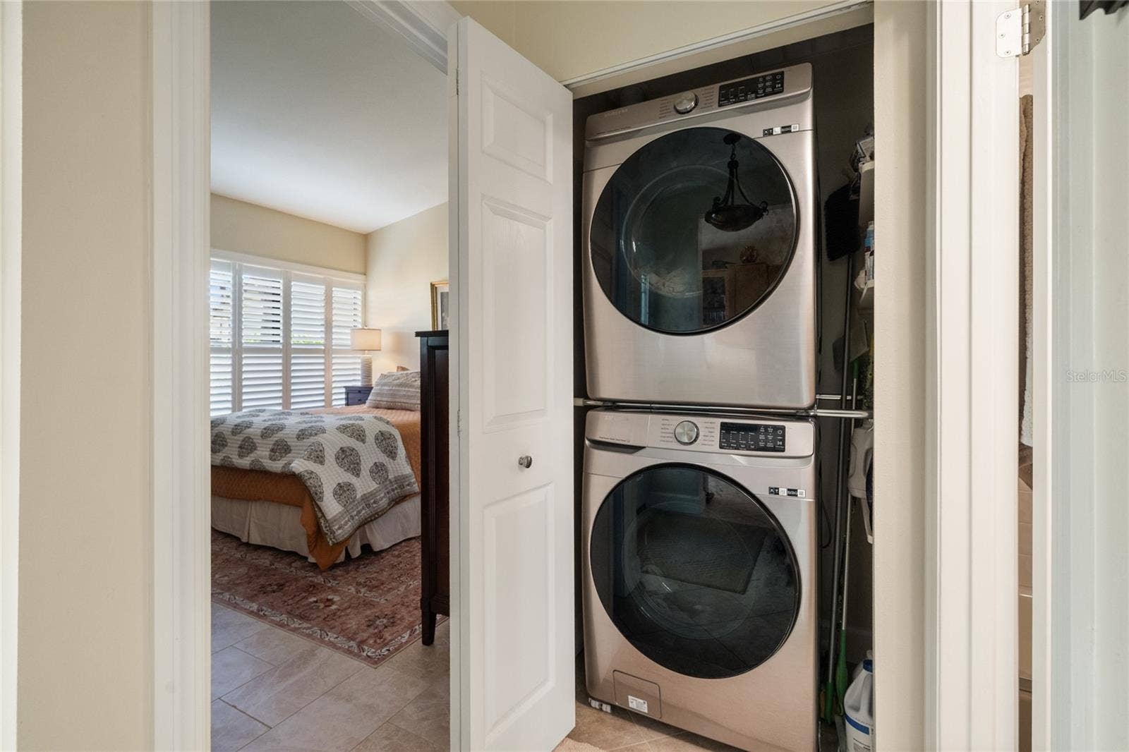 INSIDE LAUNDRY CLOSET IN HALL