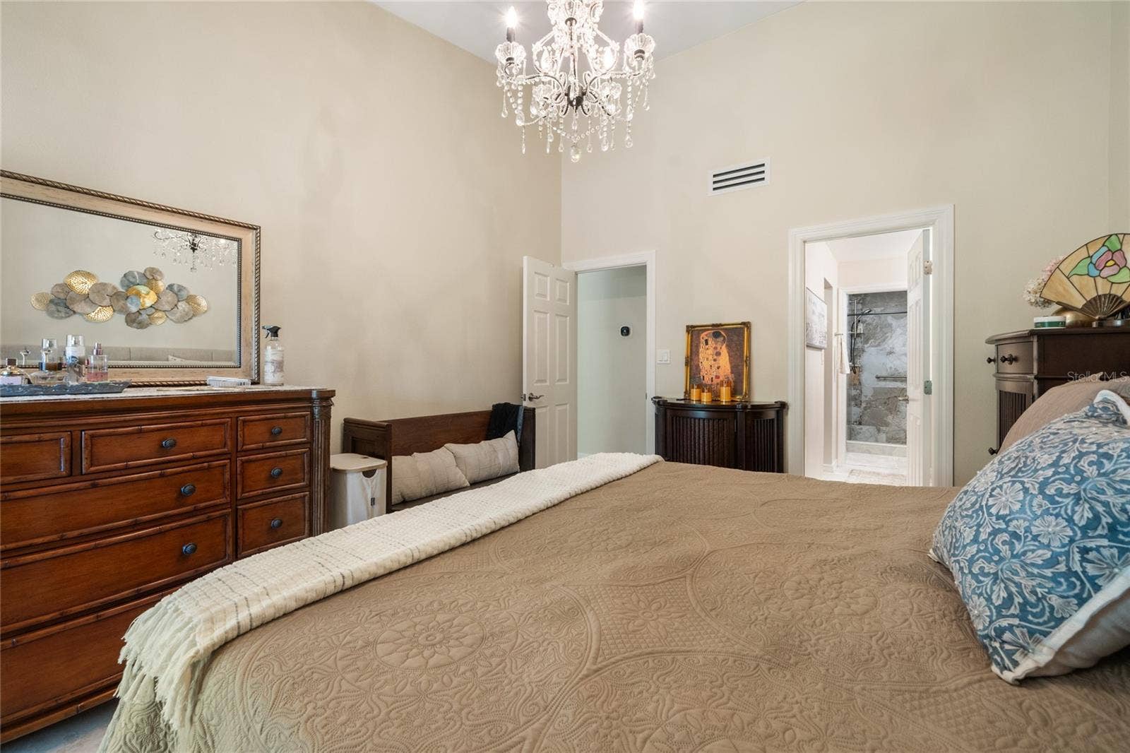 PRIMARY SUITE SHOWING ENTRANCE TO BATHROOM