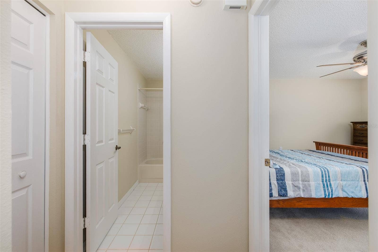 9015 WARWICK LANE, New Port Richey, FL 34655 HALL AREA TO GUEST BEDROOM