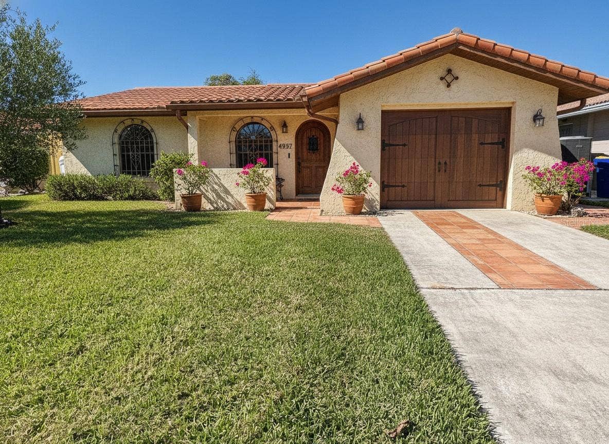 4937 DORY DRIVE, New Port Richey, FL 34652 Virtually changed front of home - This is an example converting to a new look - change the front. Easy change!!