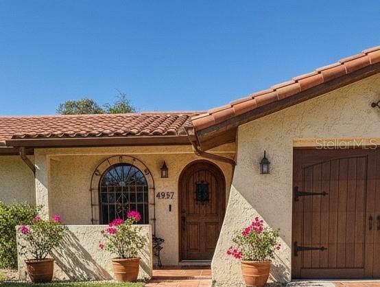 4937 DORY DRIVE, New Port Richey, FL 34652 Virtually generated - Window change and front door garage color changed