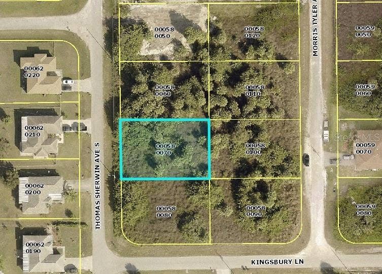 Property photo for 557 THOMAS SHERWIN AVENUE S, Lehigh Acres, FL